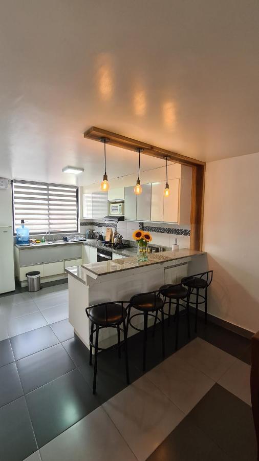 Elegante apartamento con vistas al volcán Tunguraua Baños Exterior foto